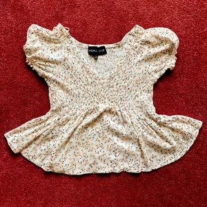 Kendall and Kylie small made in China flare out bottom T-crop shirt